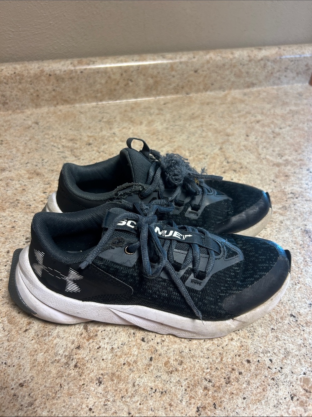 Under Armour Kids Black and White Athletic Sneakers